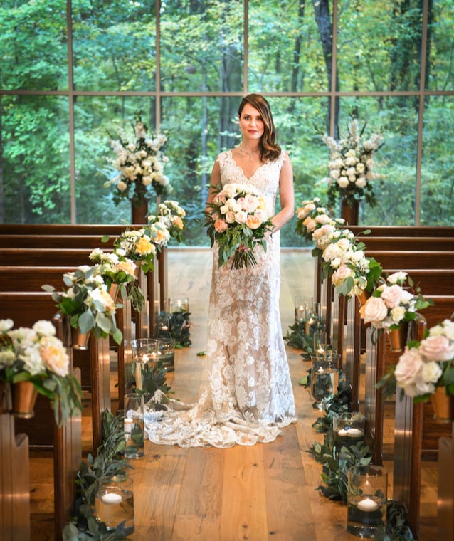 Graceland's Chapel In The Woods - Bride In Aisle